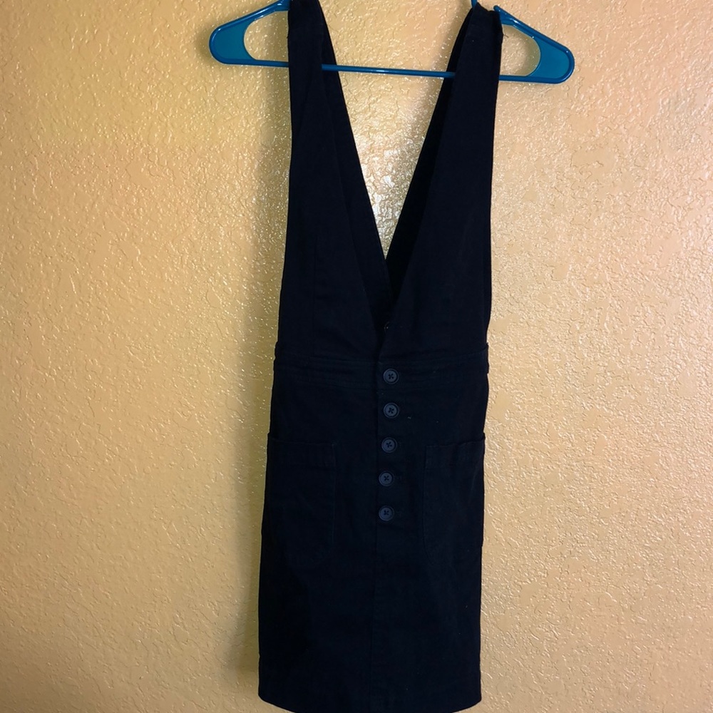 Black button overalls